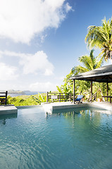 Image showing caribbean island villa pool with lovely view of grenadine island