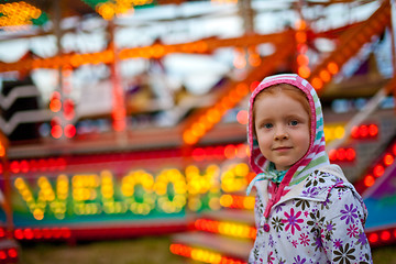 Image showing Little girl in amusement park