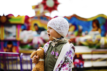 Image showing Little girl in amusement park