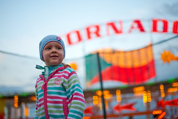 Image showing Little girl in amusement park