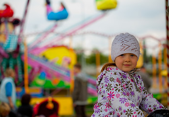 Image showing Little girl in amusement park