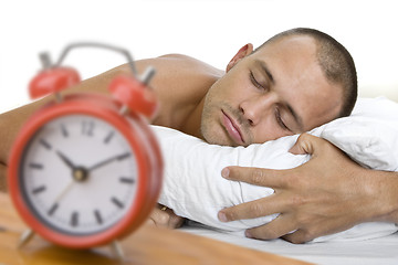 Image showing Man Asleep with Clock