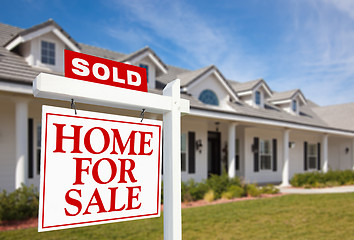 Image showing Sold Home For Sale Sign and New Home