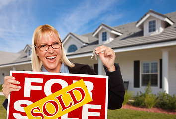 Image showing Beautiful Female Holding Keys & Sold Real Estate Sign