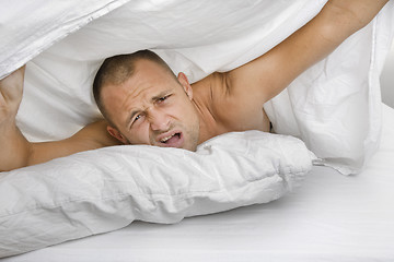 Image showing Confused Man Waking Up