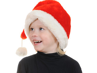 Image showing The child in a hat santa claus