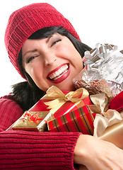 Image showing Pretty Woman Holding Holiday Gifts