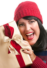 Image showing Pretty Woman Holding Holiday Gift