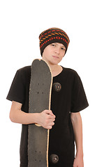 Image showing The teenager with a skateboard 