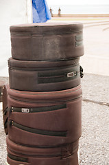 Image showing carrying cases for steel pan drums roadside port of spain trinid