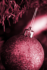 Image showing Christmas ornaments on tree.