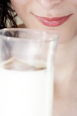 Image showing Young people eating milk with cereals