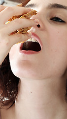 Image showing Young people eating milk with cereals