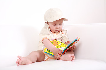 Image showing Cute baby reading