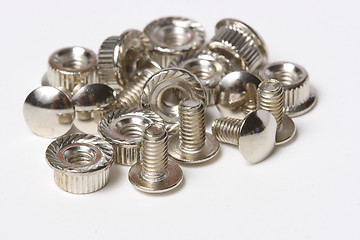 Image showing Many screws and nuts isolated on white background