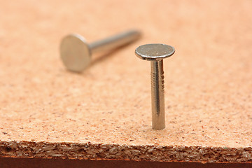 Image showing Nail and board