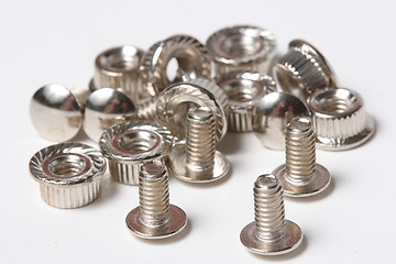 Image showing Many screws and nuts isolated on white background