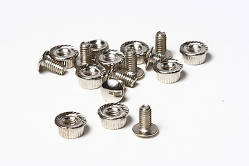 Image showing Many screws and nuts isolated on white background