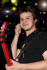 Image showing The bass guitarist