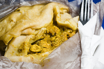 Image showing dahl pouri roti  trinidad native food wrap also called bust up s