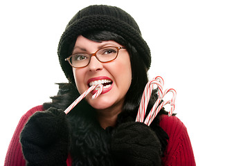 Image showing Pretty Woman Holding Candy Canes