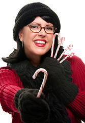 Image showing Pretty Woman Holding Candy Canes