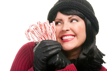 Image showing Pretty Woman Holding Candy Canes