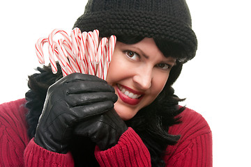 Image showing Pretty Woman Holding Candy Canes