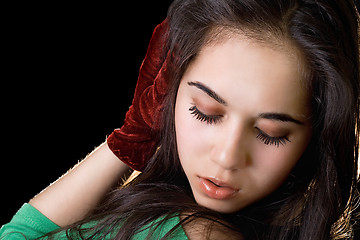Image showing Portrait of the girl with closed eyes. Isolated