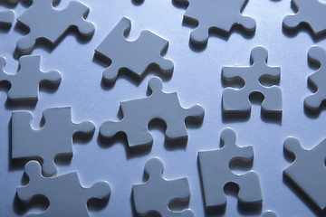 Image showing Jigsaw Pieces with Dramatic Light