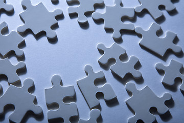 Image showing Jigsaw Pieces with Dramatic Light