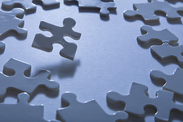 Image showing Jigsaw Pieces with Dramatic Light