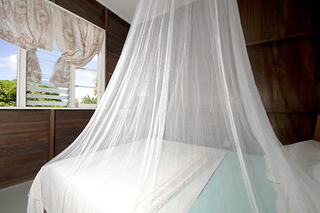 Image showing bedroom with mosquito net in budget guest house bequia