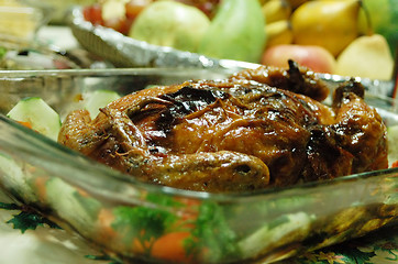 Image showing stuffed boned chicken served on glass tray