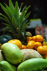 Image showing mangoes, oranges, melons, and pineapple