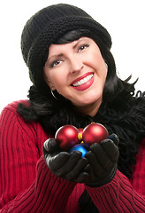 Image showing Attractive Woman Holding Christmas Ornaments