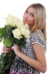 Image showing Girl with bunch of flowers