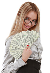 Image showing Girl with fan of dollars