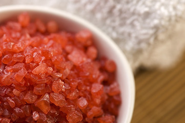 Image showing bath salt and towel. red and white