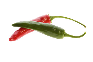 Image showing hot chilli peppers isolated on white