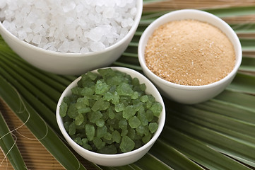 Image showing bath salt and palm leaf