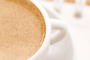 Image showing notebook and cup of coffee