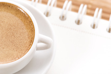 Image showing notebook and cup of coffee