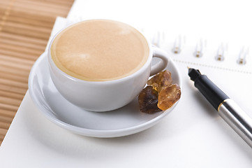 Image showing pen, notebook and cup of coffee