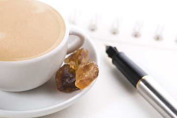 Image showing pen, notebook and cup of coffee