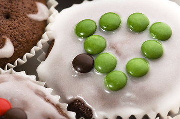 Image showing first chocolate muffins. christmas tree