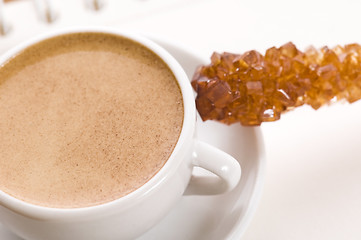 Image showing notebook, sugar and cup of coffee