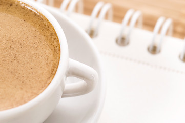 Image showing notebook and cup of coffee