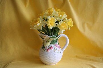 Image showing Daffodil in  pot with  cherry and flowers