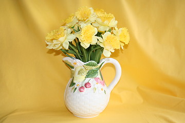 Image showing Daffodils in  pot with  cherry and flowers